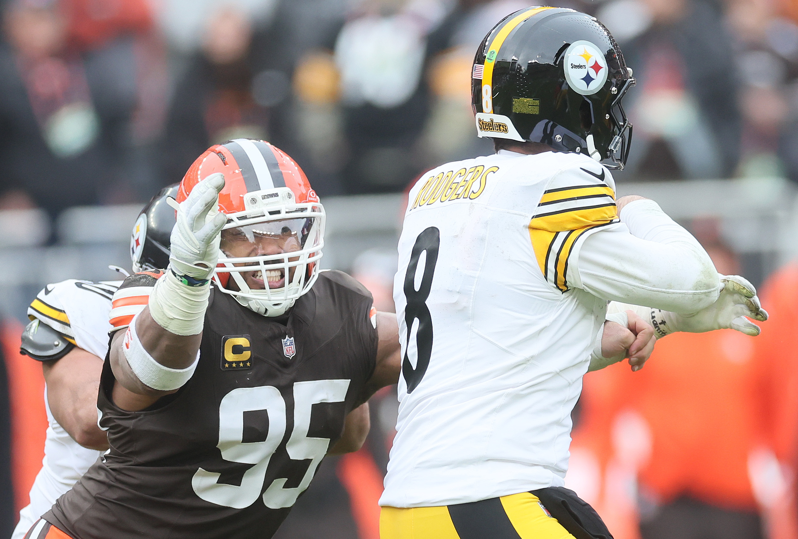 Cleveland Browns defensive end Myles Garrett puts pressure on Pittsburgh Steelers quarterback Aaron Rodgers on a pass play in the second half.  