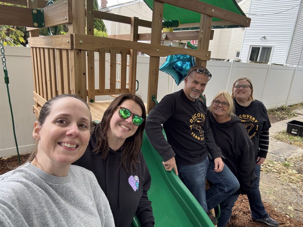 Discovery Federal Credit Union builds playset for area child