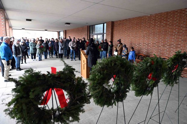 Jackie Grauert, assistant director at Gethsemane Cemetery, leads a Wreaths Across America ceremony at the cemetery in Muhlenberg Township on Saturday, Dec. 13, 2025. (BILL UHRICH/READING EAGLE)