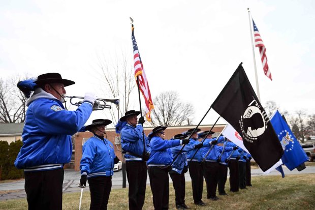Randall Mutter of Muhlenberg Township plays taps with the Buccaneers Alumni during a Wreaths Across America ceremony at Gethsemane Cemetery in Muhlenberg Township on Saturday, Dec. 13, 2025. (BILL UHRICH/READING EAGLE)