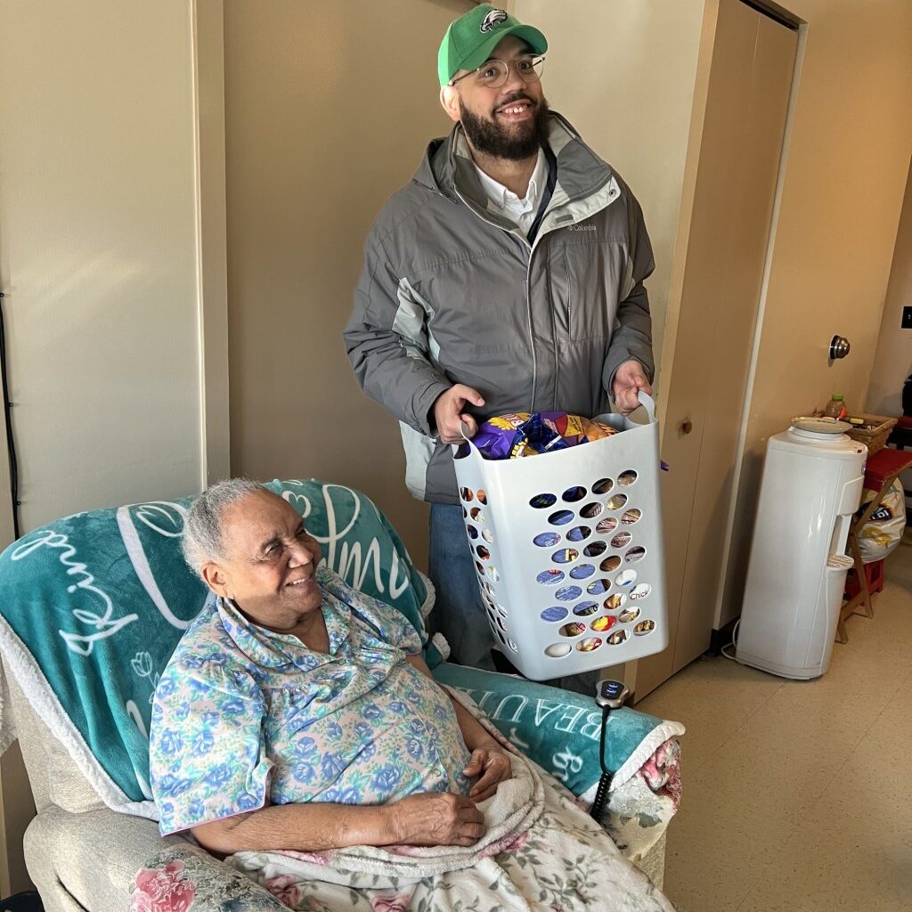 Reading lawmaker joins direct care workers to deliver holiday baskets