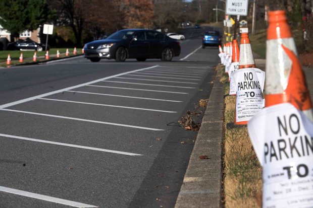 Hampden Boulevard is a state road under PennDOT's authority, and the agency's consulting engineers recommended the removal of curbside parking at four intersections following a study of speeding and crash patterns. (BILL UHRICH/READING EAGLE)