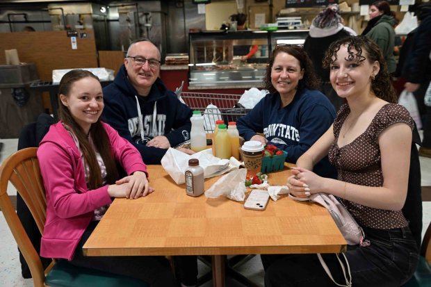 Joe and Tricia Flock of Slippery Rock but formerly from Berks County with their daughters Ruth, 18, and Theresa, 16, enjoy visiting the Fairgrounds Farmers Market, 2934 N. Fifth St. Highway in Muhlenberg Township on Saturday, Dec. 27, 2025. (BILL UHRICH/READING EAGLE)