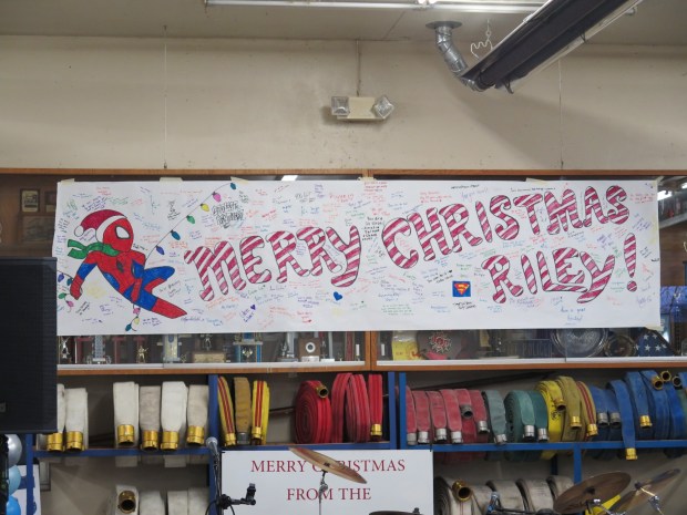 A superhero-themed Christmas party was held at Union Fire Company in Leesport on Saturday in honor of Riley Rejniak, 13, who has been battling cancer since he was in kindergarten. (DAVID MEKEEL - READING EAGLE)