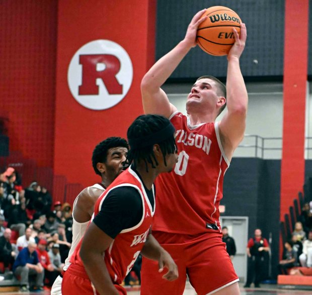 Wilson's Michael Glover gets a put-back against Reading High in a 52-44 Bulldog victory over the Red Knights on Firday, Dec. 19, 2025, at the Geigle. (BILL UHRICH/READING EAGLE)