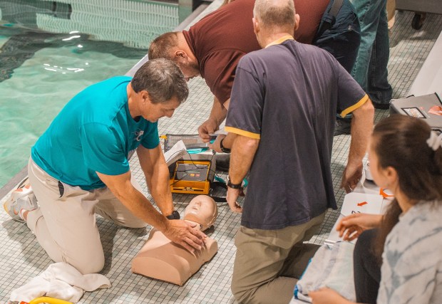 Coaches and athletic trainers from Berks County schools participated in a pool rescue event featuring several scenarios, including a cardiac arrest, a head and spine injury, and a panic attack. (Submitted photo)