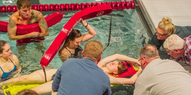 Coaches and athletic trainers from Berks County schools participated in a pool rescue event featuring several scenarios, including a cardiac arrest, a head and spine injury, and a panic attack. (Submitted photo)