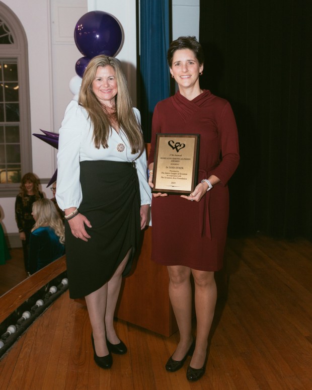 Scranton Area Community Foundation President and CEO Laura Ducceschi, left, congratulates Dr. Tania Stoker, recipient of the 2025 Roseann Smith Alperin Award, during the Women in Philanthropy Annual Celebration at the Century Club of Scranton on Nov. 5. (Submitted)