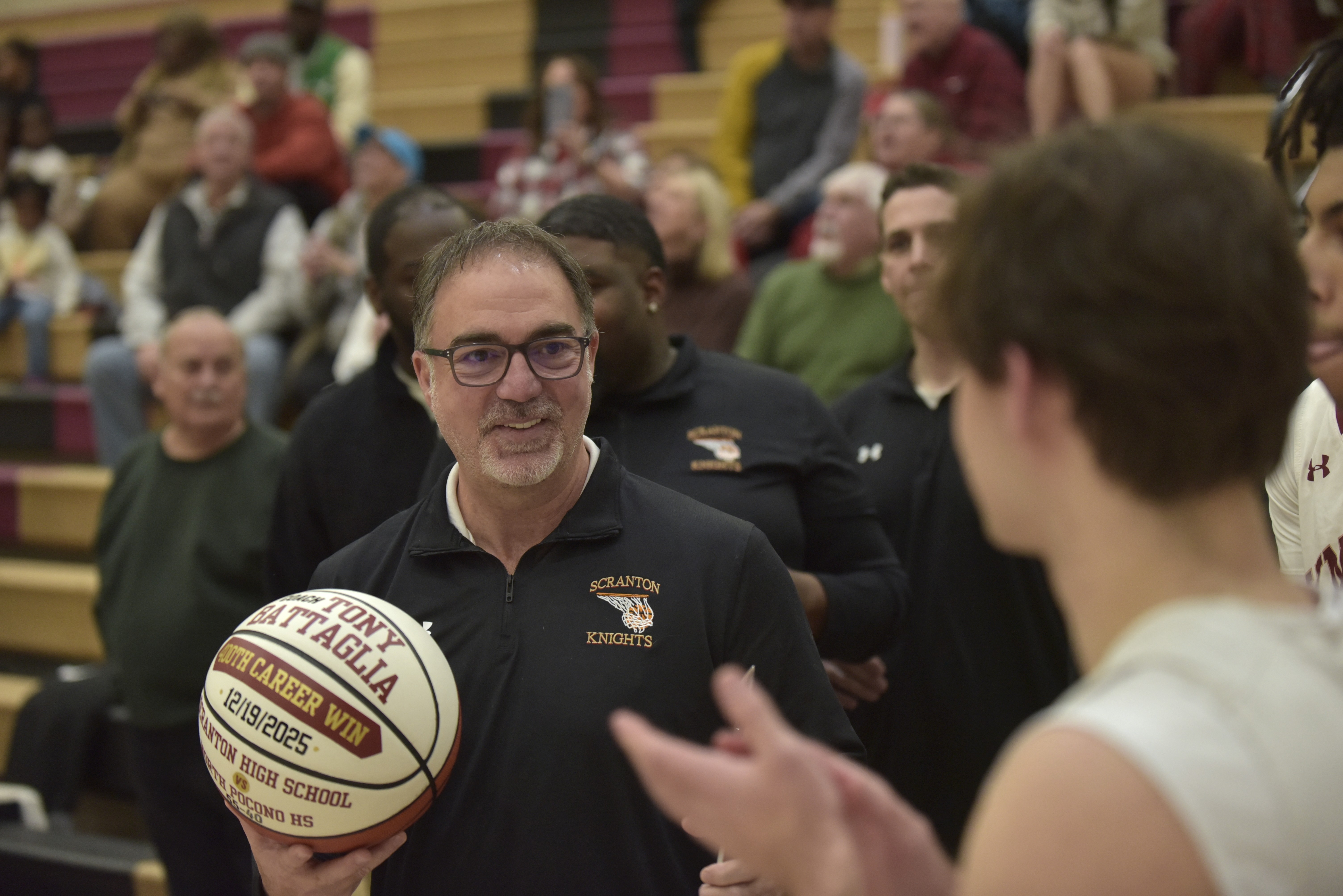 Scranton High School boys basketball coach Tony Battaglia was honored...