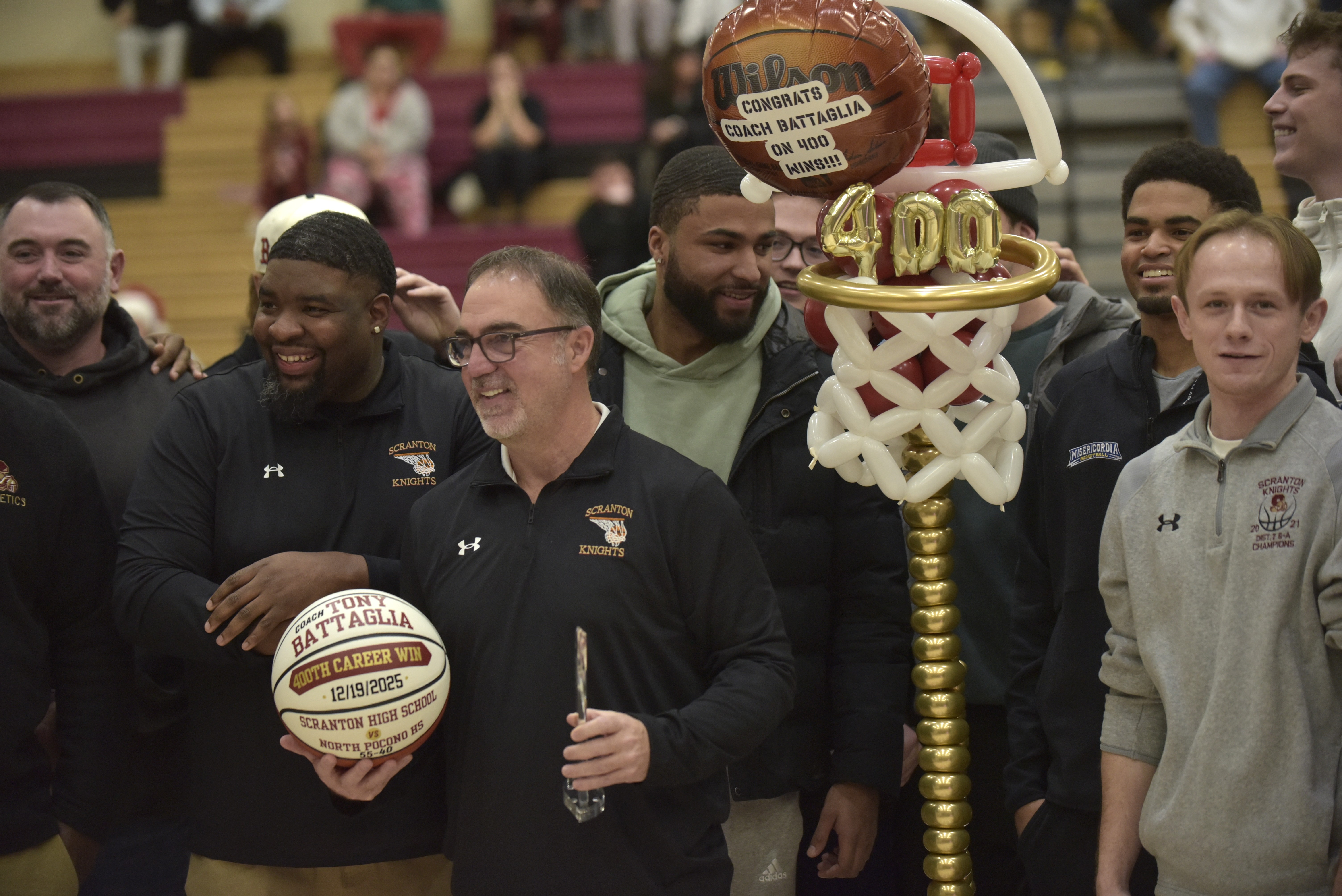 Scranton High School boys basketball coach Tony Battaglia was honored...