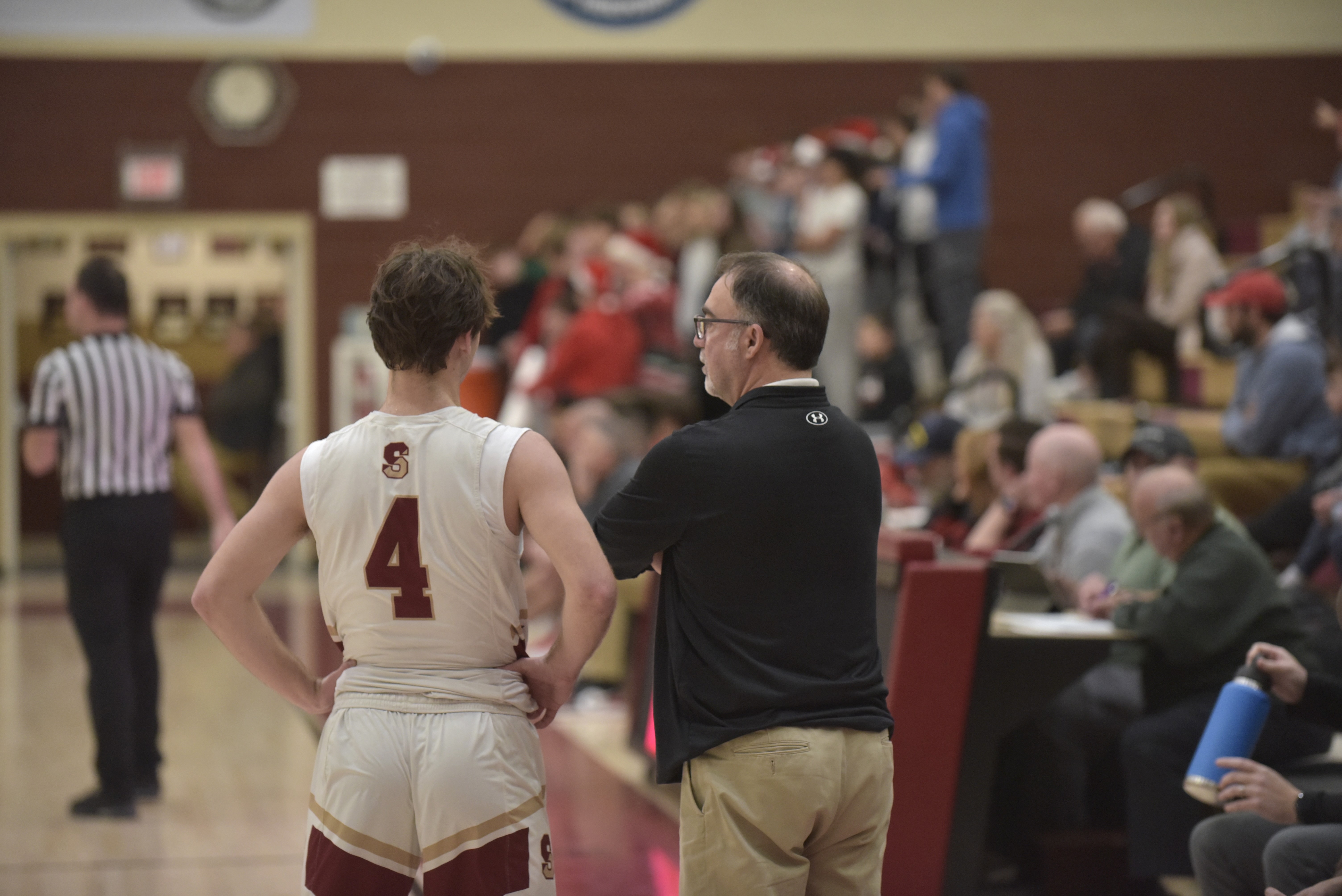 Scranton High School boys basketball coach Tony Battaglia patrols the...