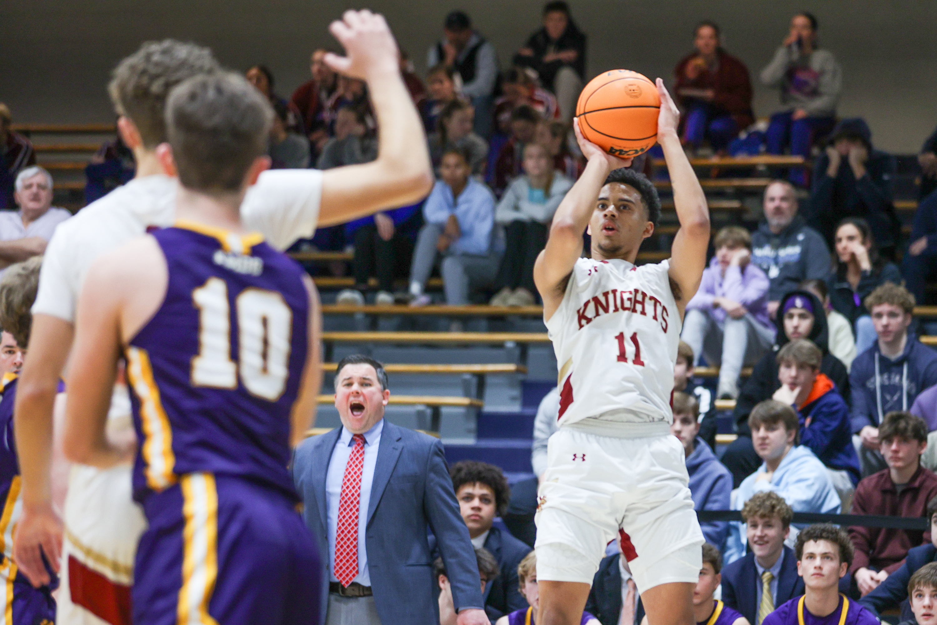 Scranton’s Deondre Dickey (11) takes a three-point shot during the...