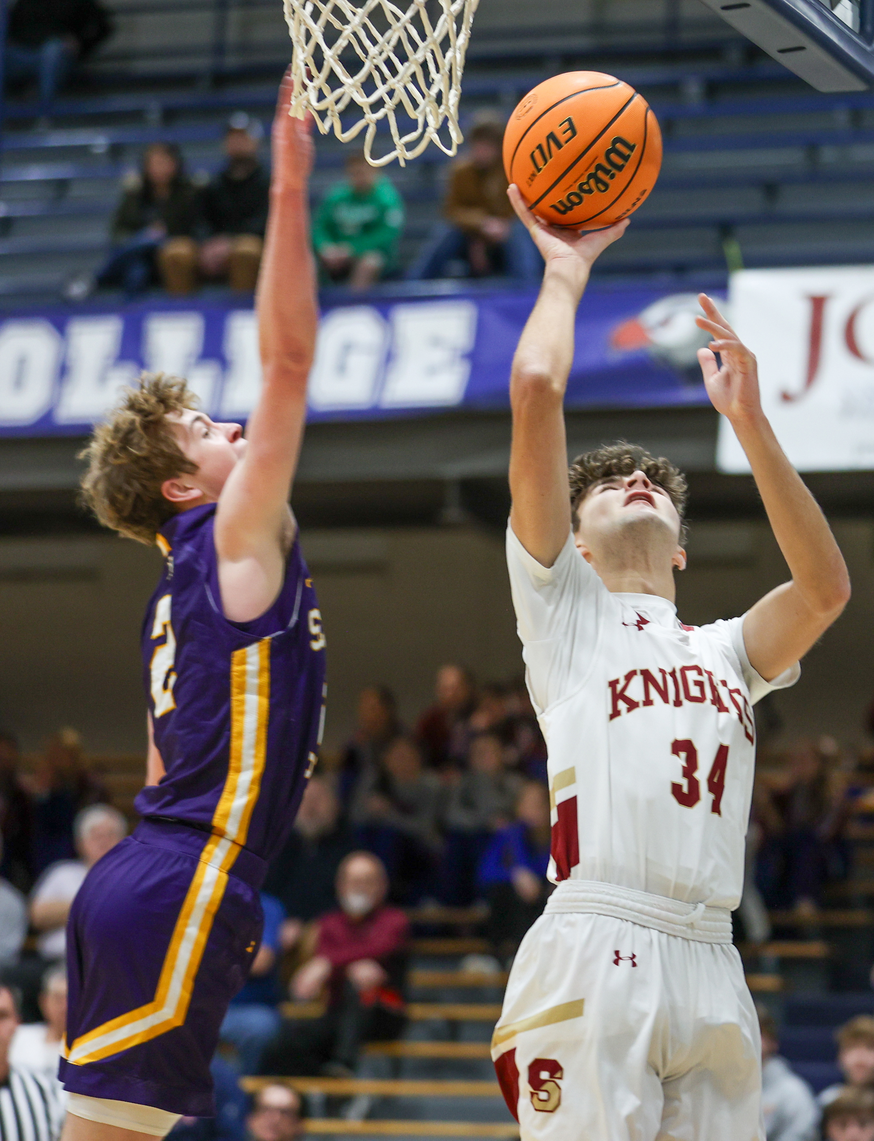 Scranton’s Brady Hopkins (34) shoots a layup as Scranton Prep’s...