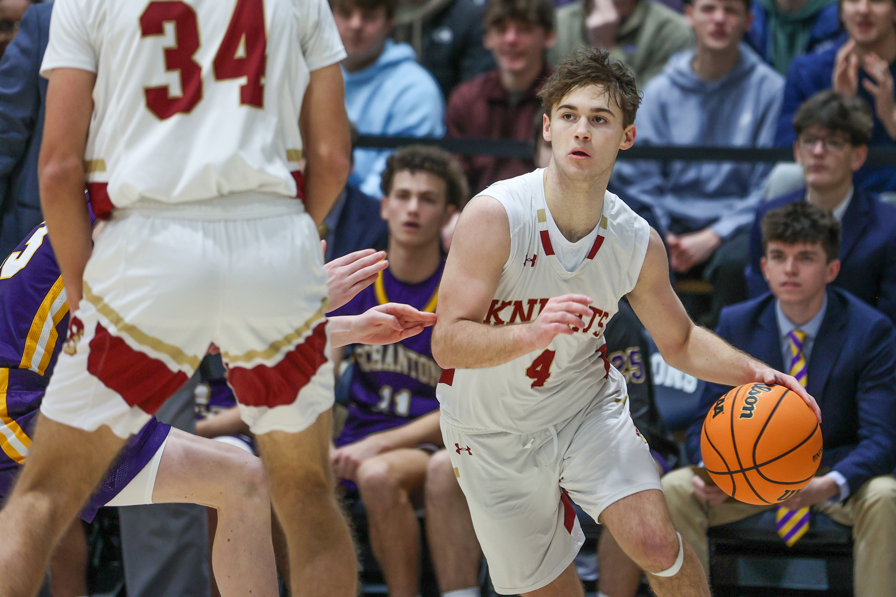 Scranton’s Tony Battaglia (4) drives toward the basket during the...