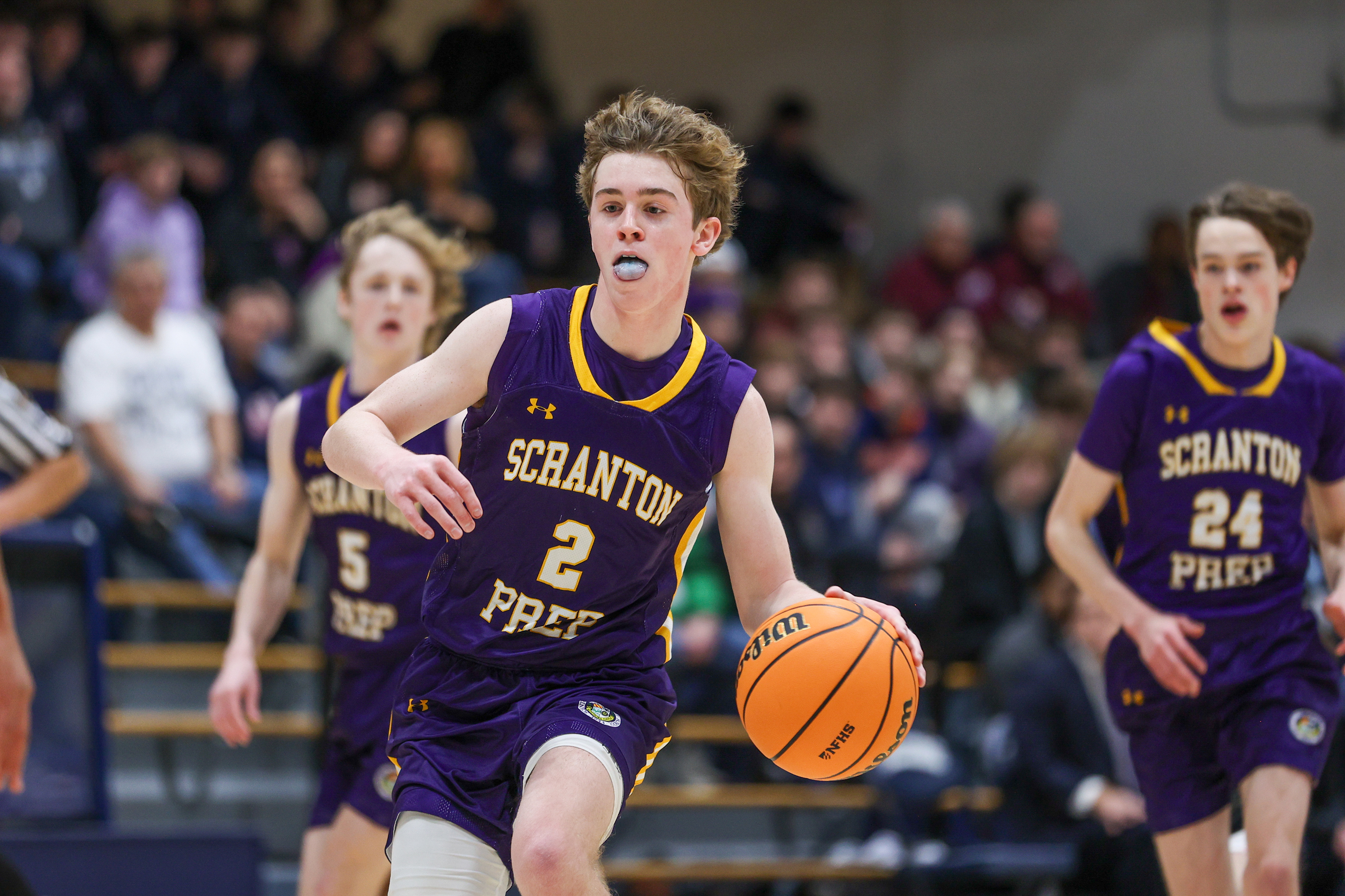 Scranton Prep’s Brody Martin (2) drives down the court during...
