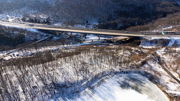 The Twin Bridges on Interstate 84 spans over Roaring Brook and the active Delaware, Lackawanna and Western (DL&W) Railroad Thursday, December 18, 2025. (SEAN MCKEAG / STAFF PHOTOGRAPHER)