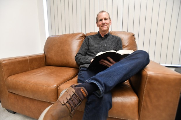 Pastor Chris Stark poses for a photograph in his office at the Rock Church Worship Center in Scranton Friday, December 19, 2025. (SEAN MCKEAG / STAFF PHOTOGRAPHER)