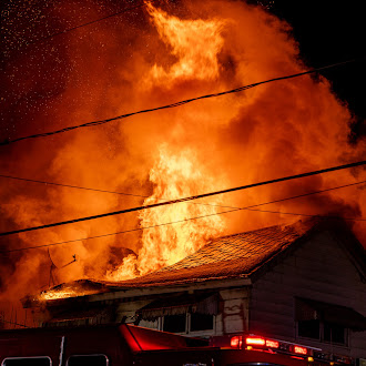 A fire at 3229 Cedar Ave. in Scranton on Sunday,...