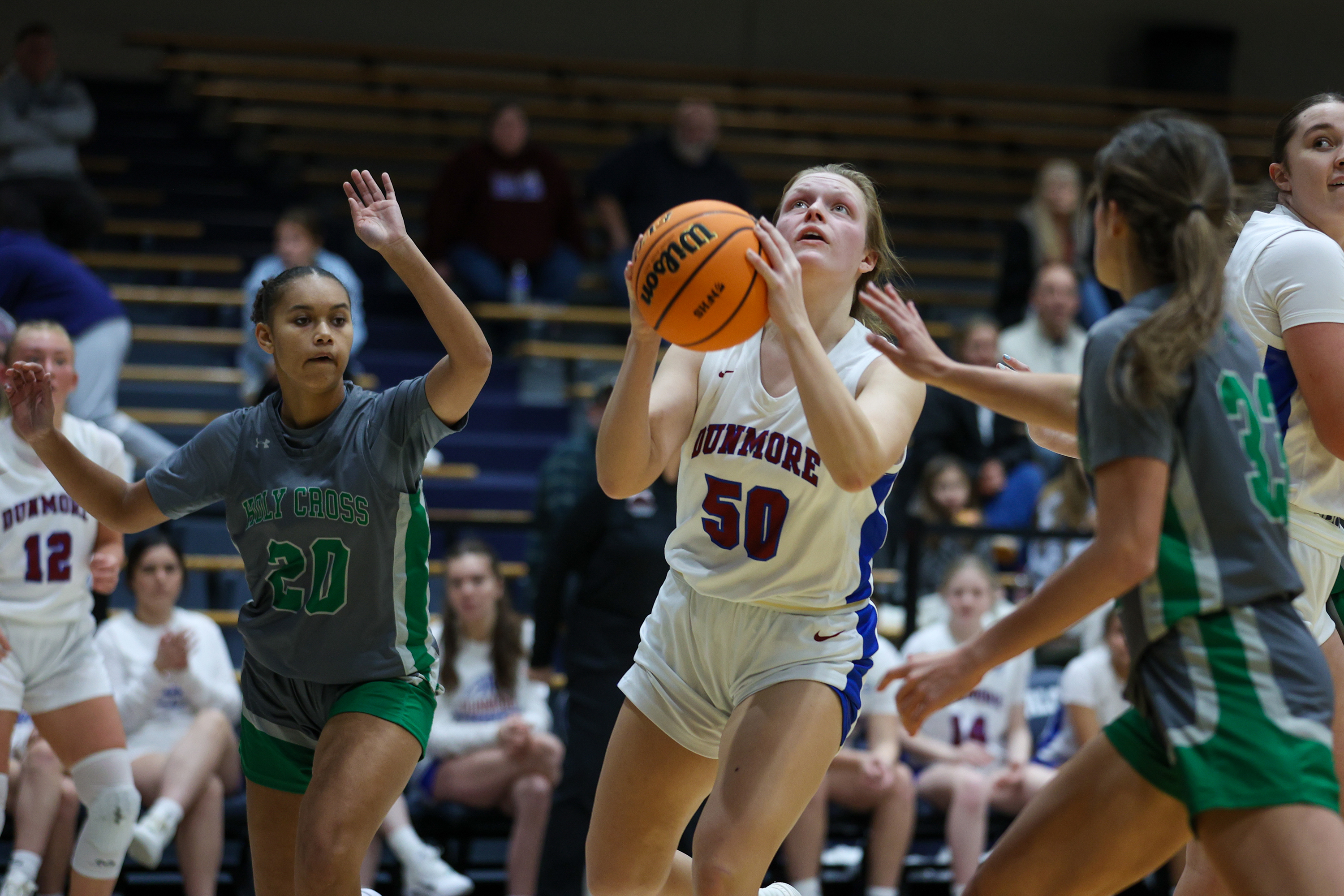 Dunmore’s Jackie Brown (50) shoots a layup during the 74th...