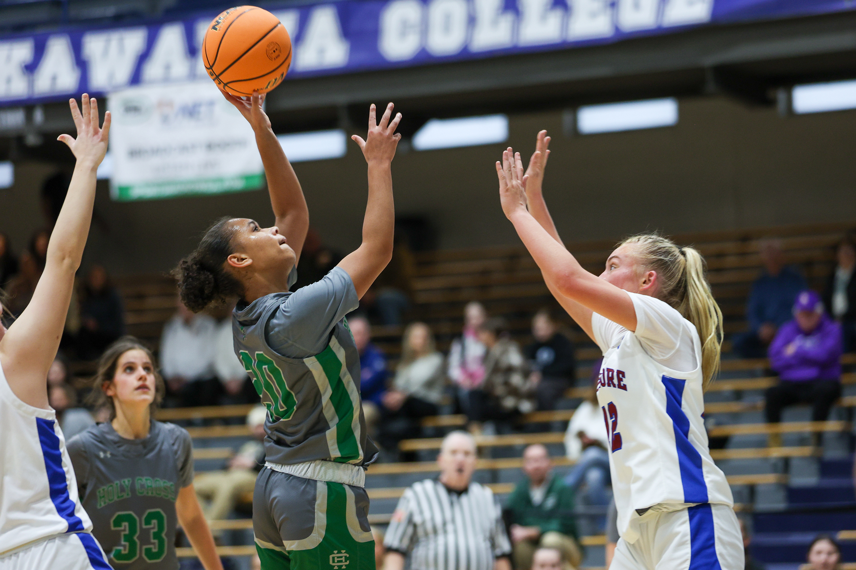 Holy Cross’ Malice Blackwell (20) shoots a layup during the...