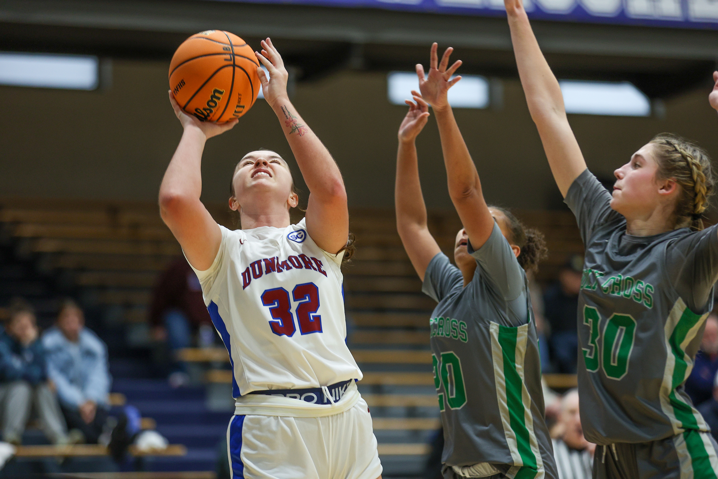 Dunmore’s Michelle Nidoh (32) shoots a layup during the 74th...