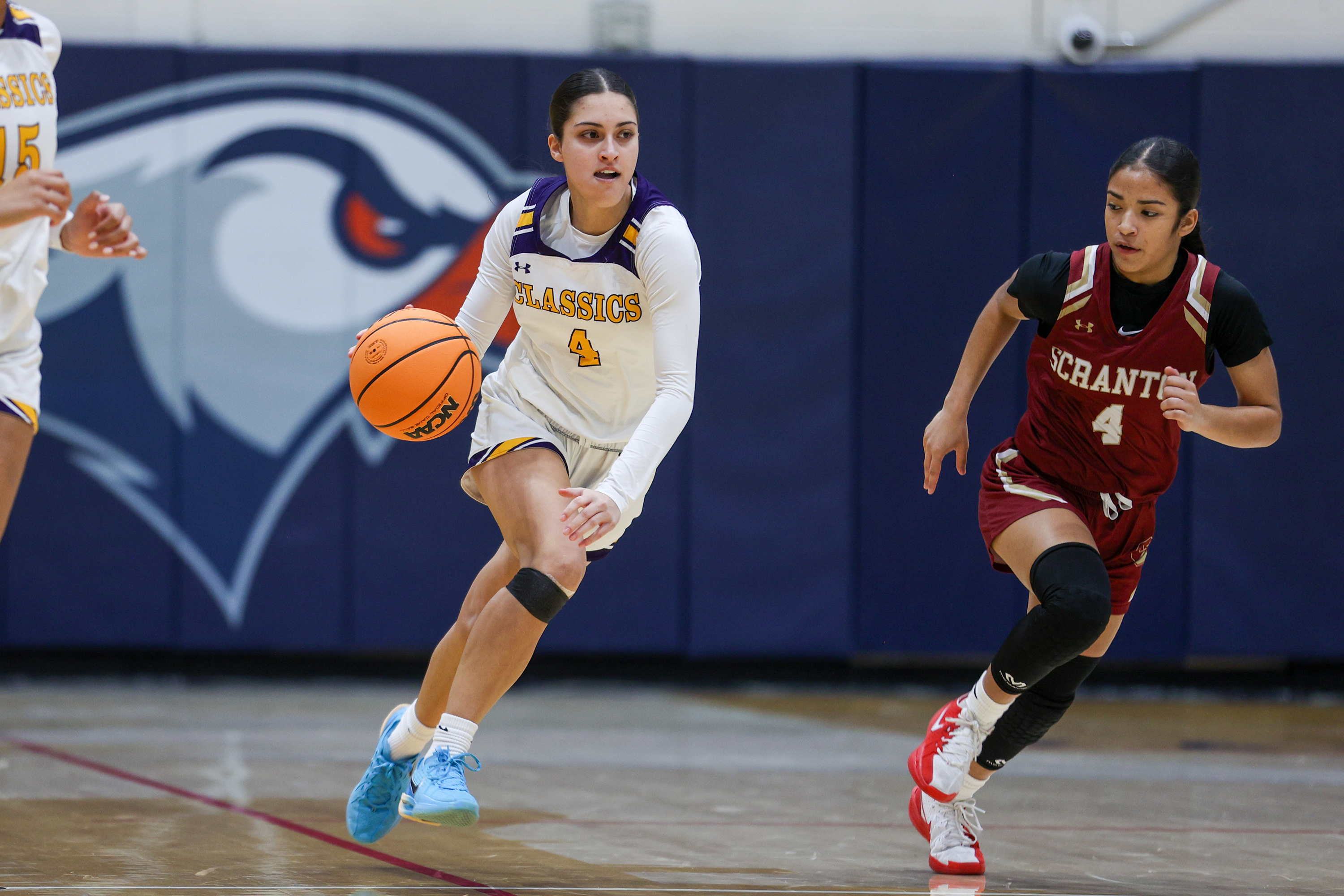 Scranton Prep’s Ava Fenton (4) drives down the court during...
