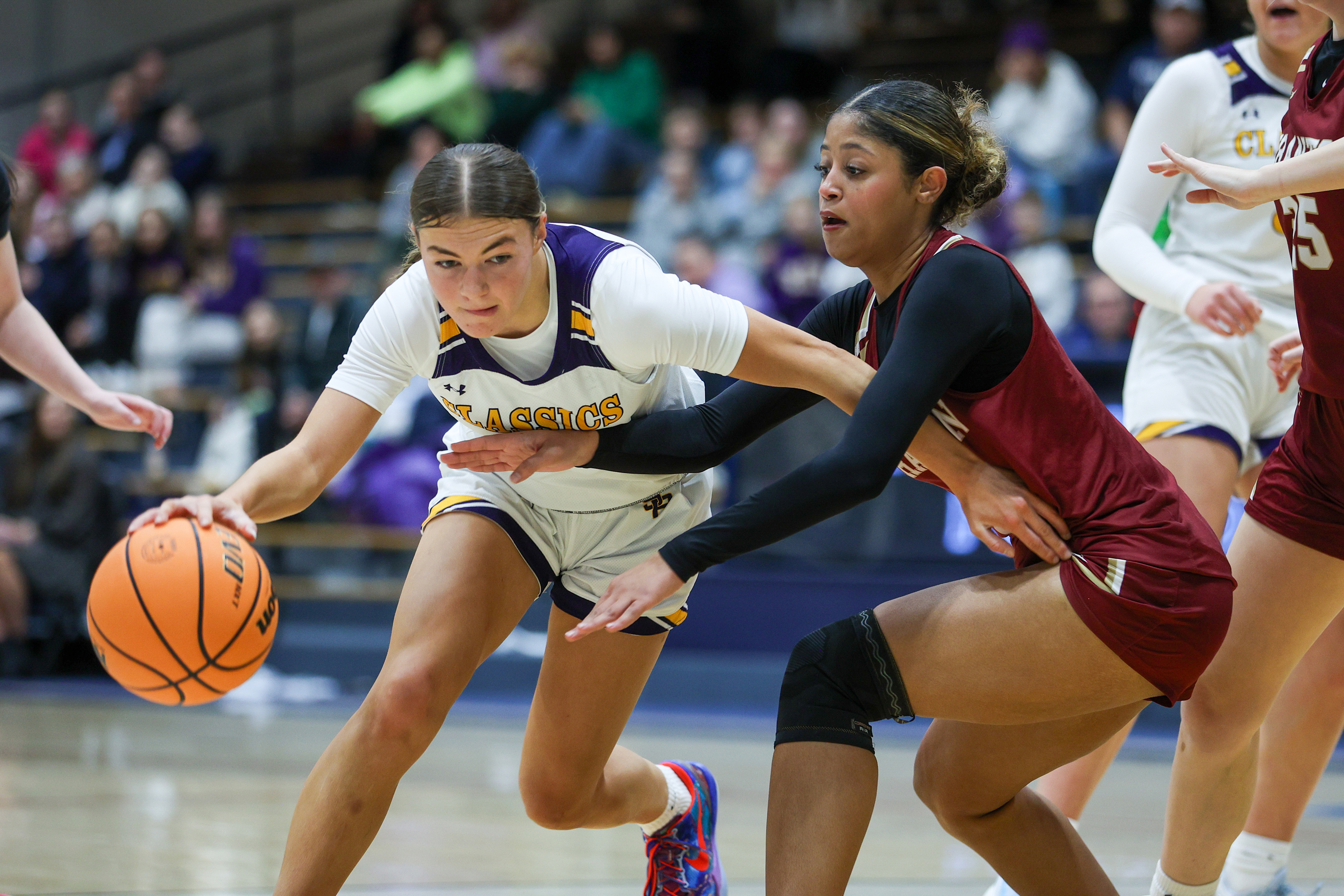 Scranton Prep’s Eva Kaszuba drives through a defender during the...