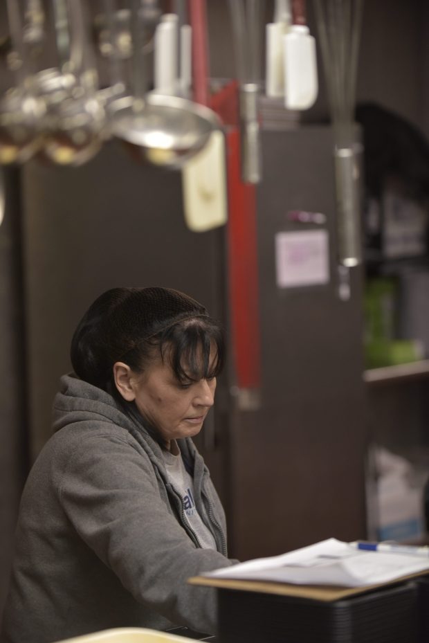 Susie Mellen assemble meals at Meals on Wheels on Wyoming Avenue on Scranton on Monday, Dec. 22, 2025. (.CHAD SEBRING/STAFF PHOTO)