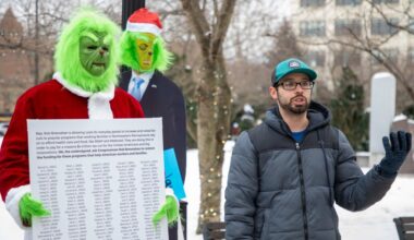 Protesters demand action from U.S. Rep. Rob Bresnahan (photos)