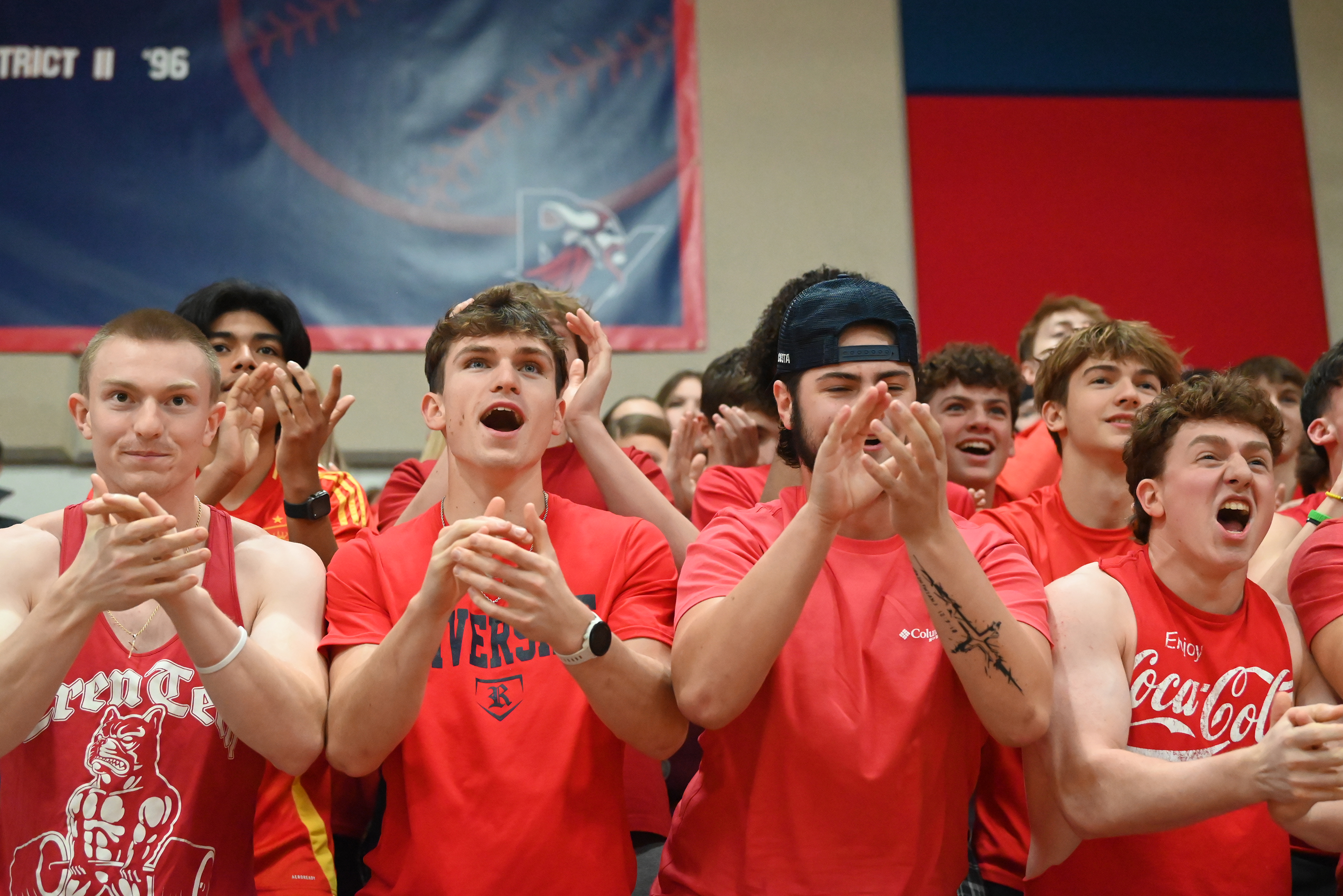 Riverside fans cheer on their team as players run onto...