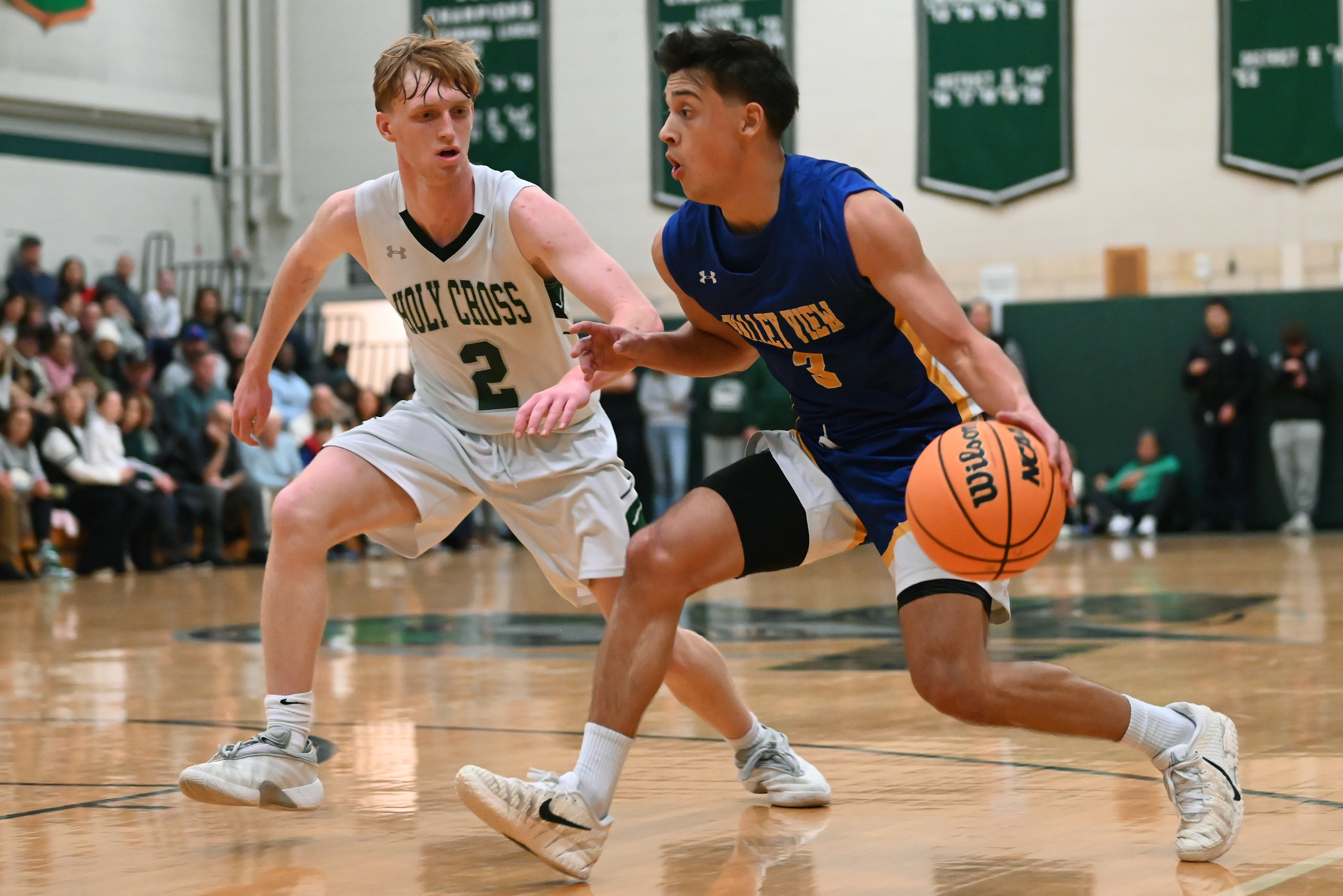 Valley View’s Michael Muto moves pass Holy Cross’ Adam Badyrka...