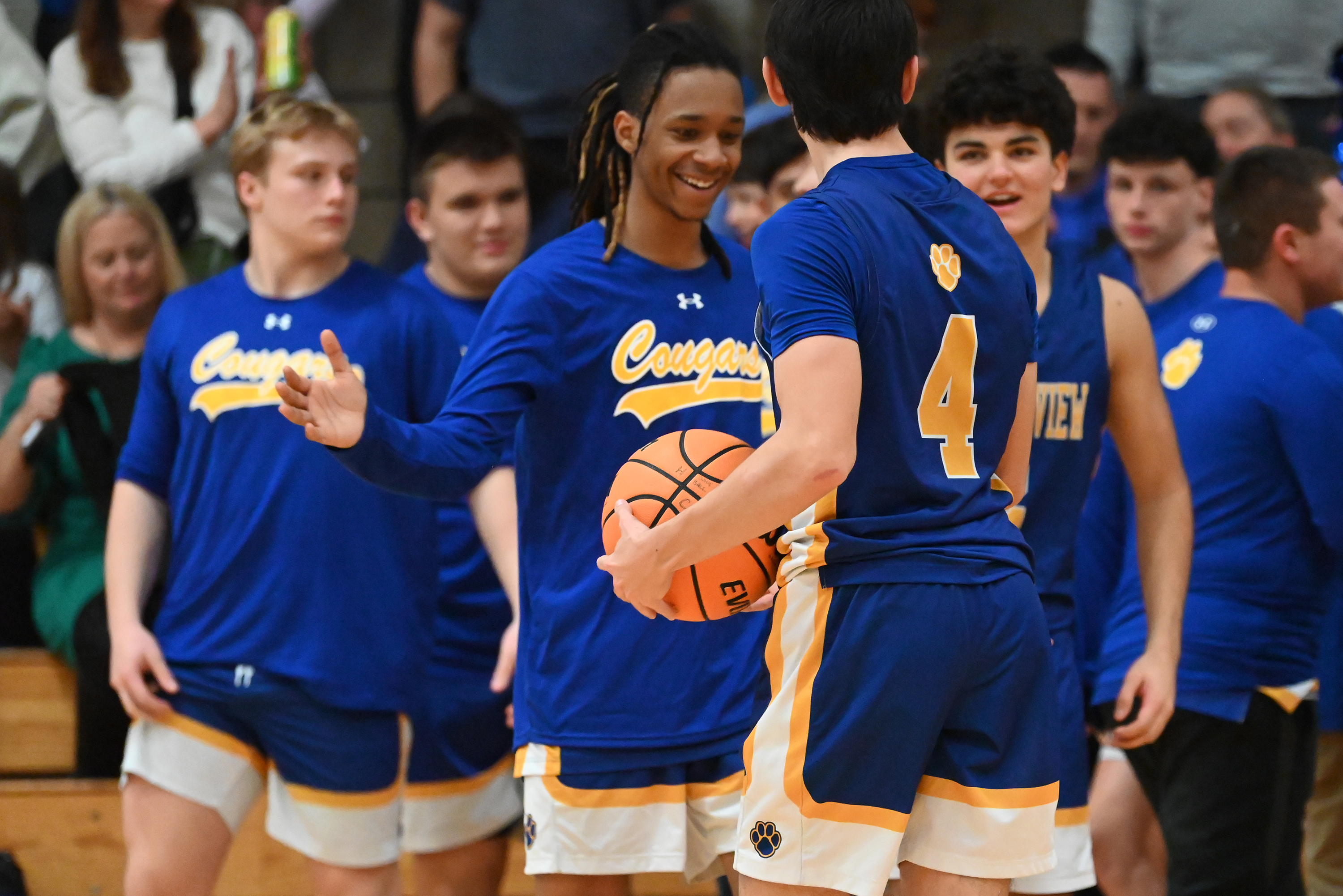 Valley View players celebrate their win over Holy Cross after...