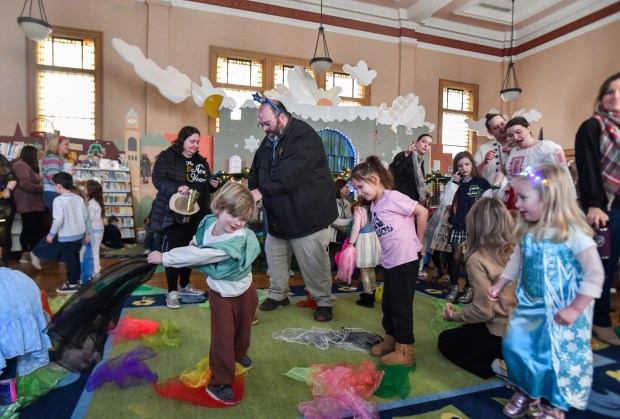 Children dance during the Noon Year's Eve: Countdown to 12:00 PM party at the Lackawanna County Children's Library in Scranton Wednesday, December 31, 2025. (SEAN MCKEAG / STAFF PHOTOGRAPHER)