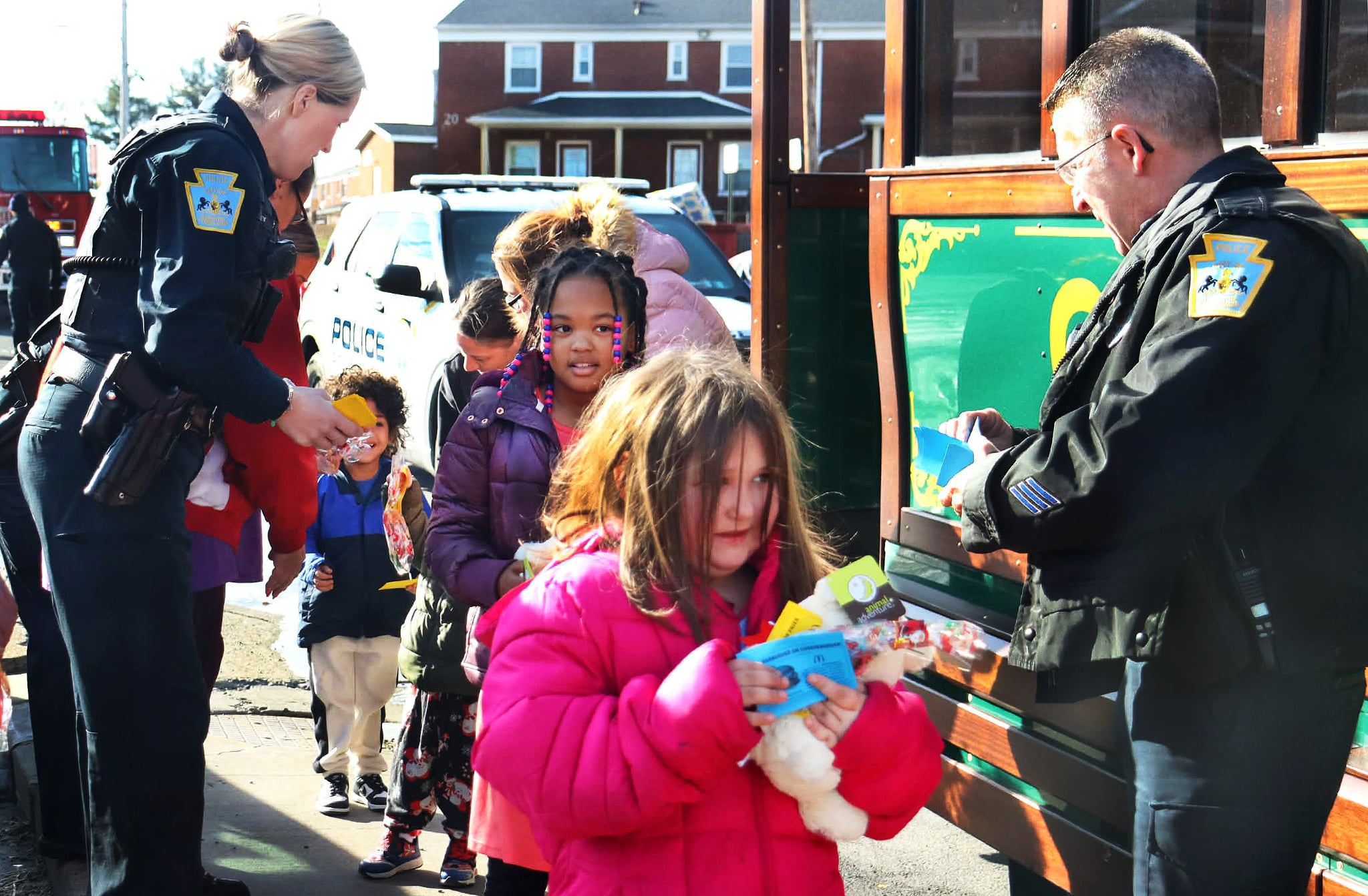 Scranton Police officers including Det. Jill Foley, left, and Ptlm....