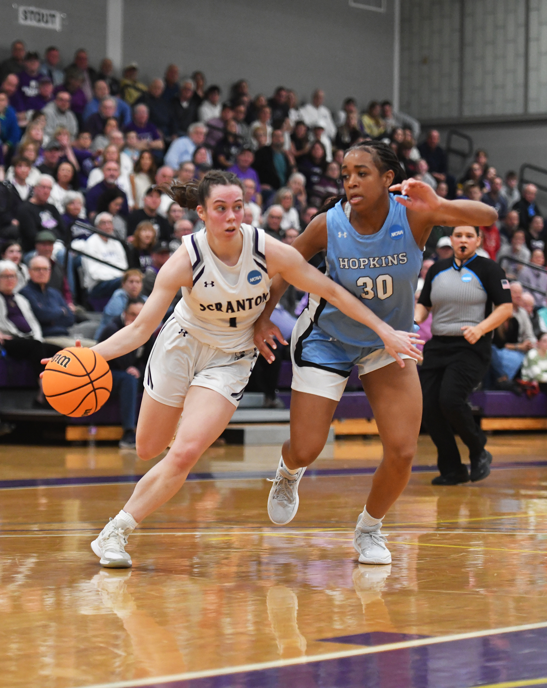 Scranton’s Kaeli Romanowski, left, is covered by Johns Hopkins’ Layla...