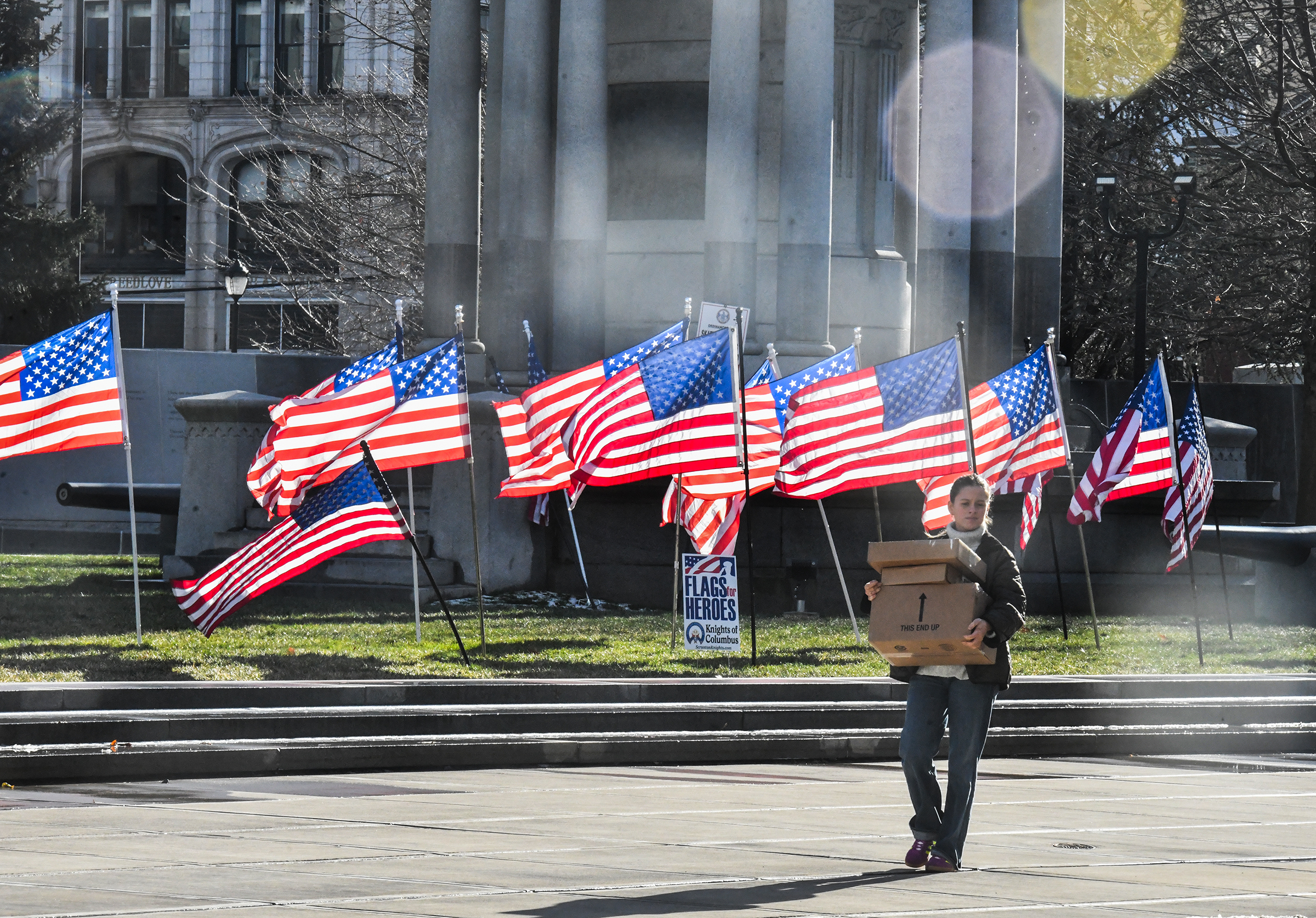 A pedestrian crosses N. Washington Ave. in Scranton Monday, December...
