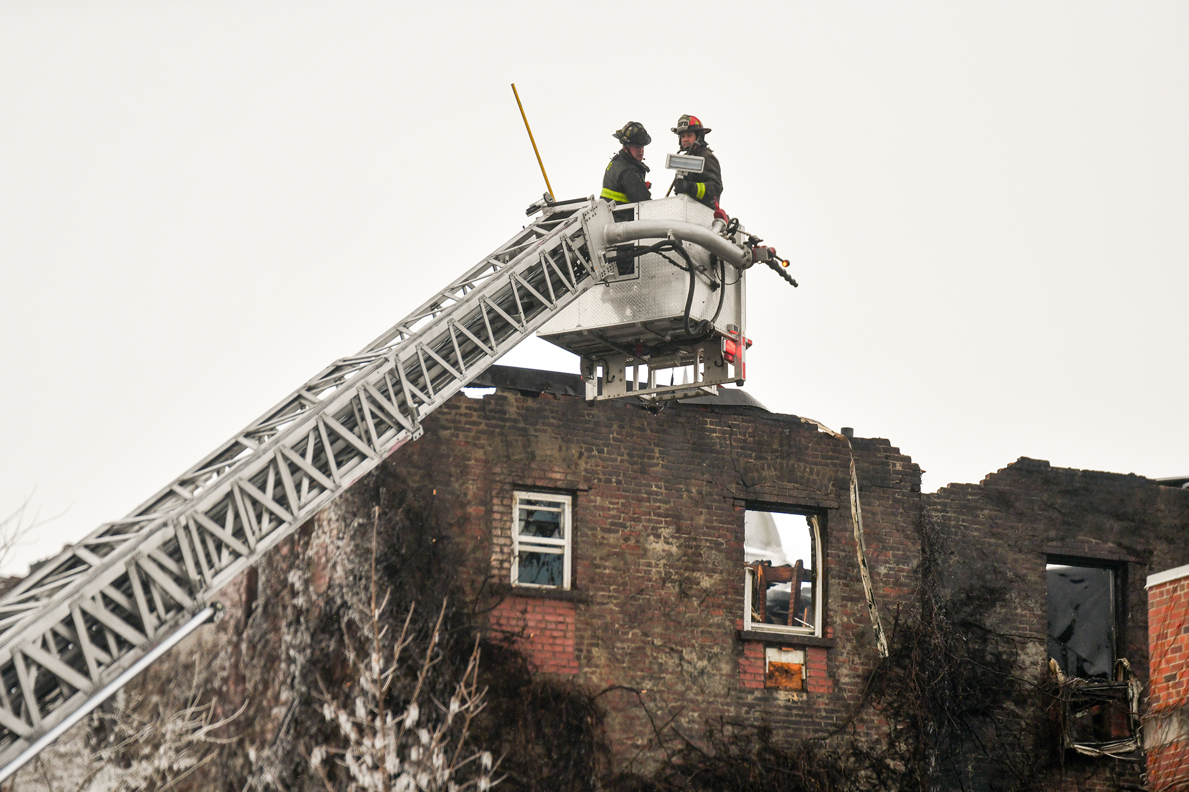 Scranton firemen work at the West Side Hotel in Scranton...