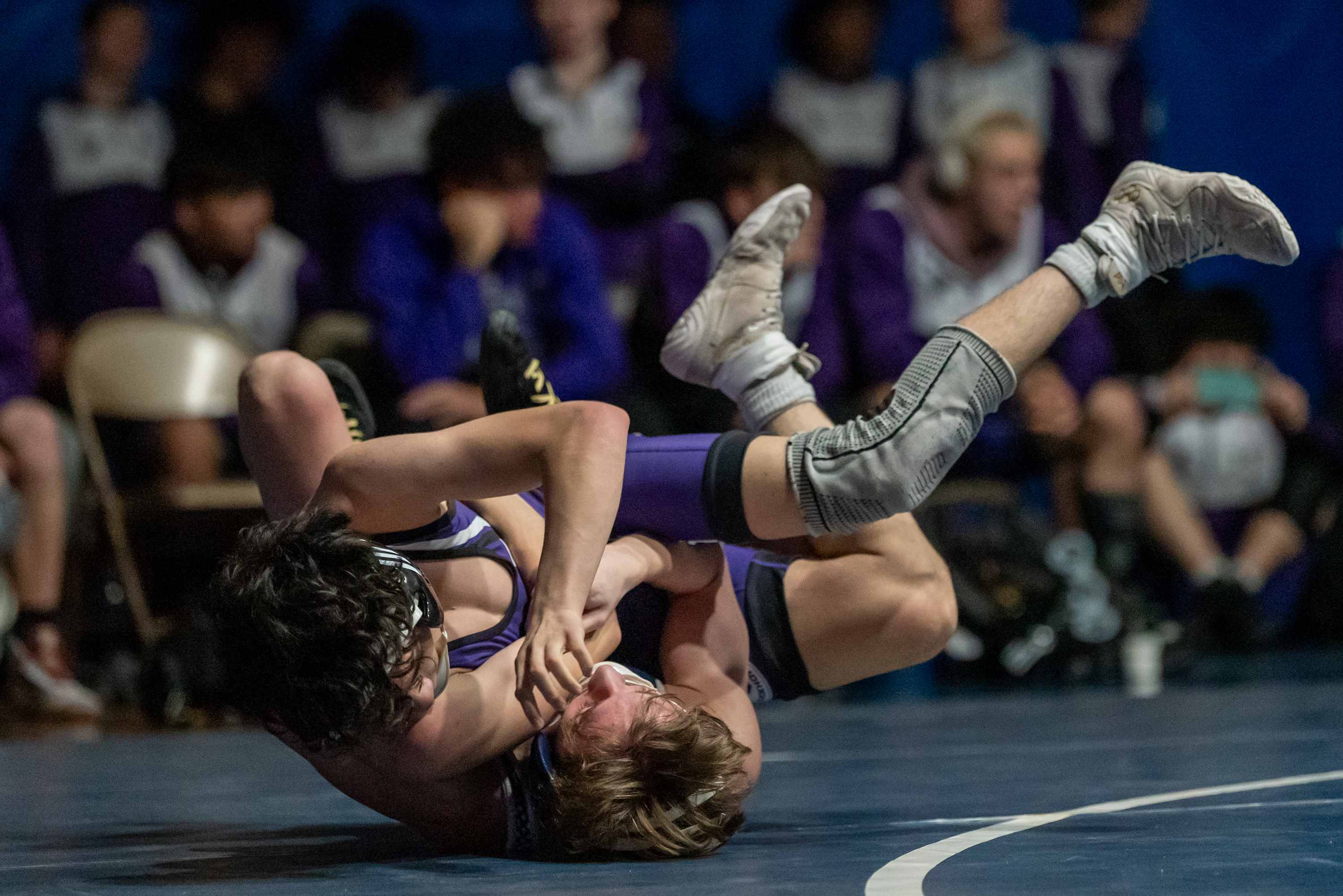 West Scranton’s Santino Aniska, bottom, wrestles Wallenpaupack’s Brodey Resino during...