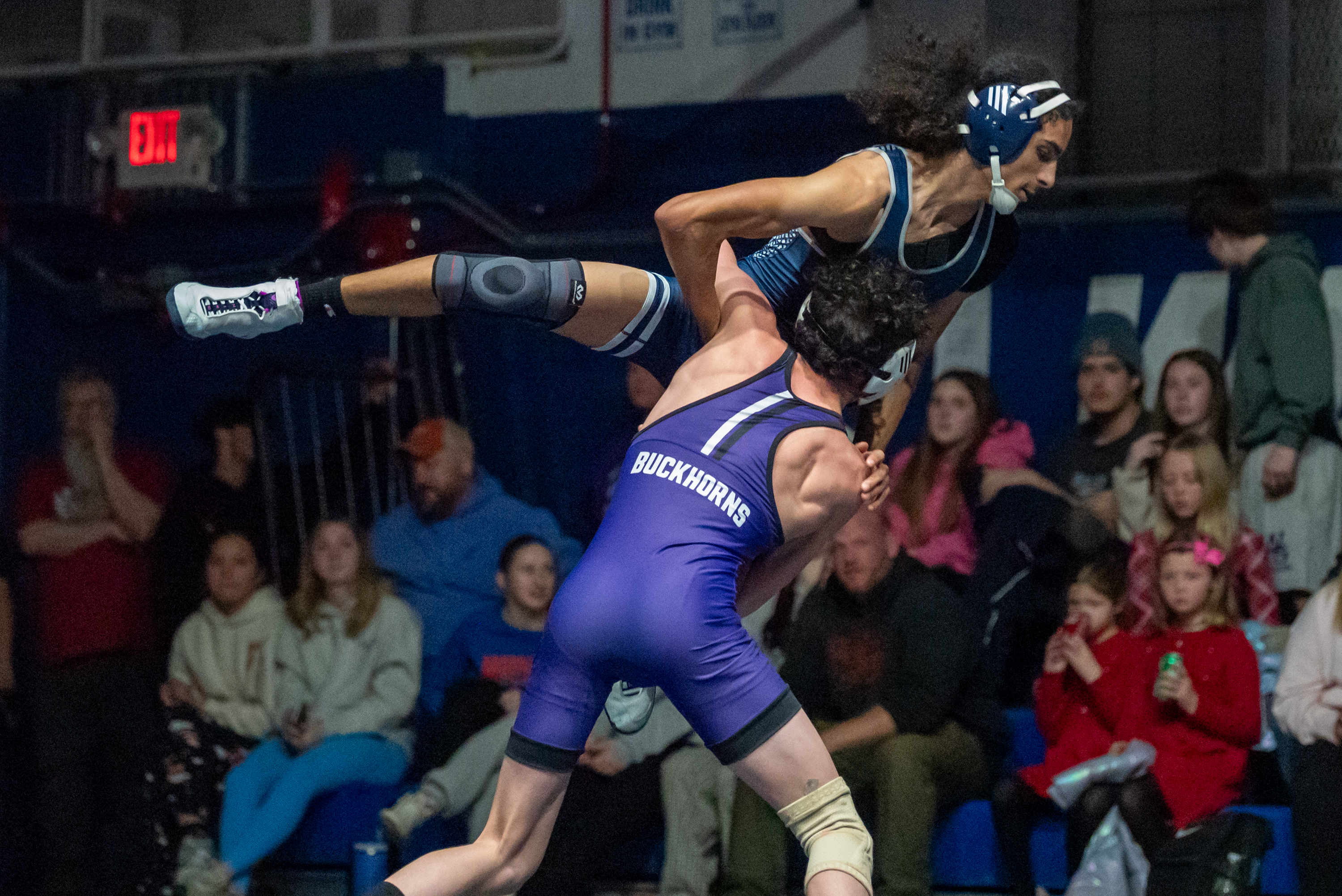 Wallenpaupack’s Ayden Blaut lifts West Scranton’s Anthony Olavarria off the...