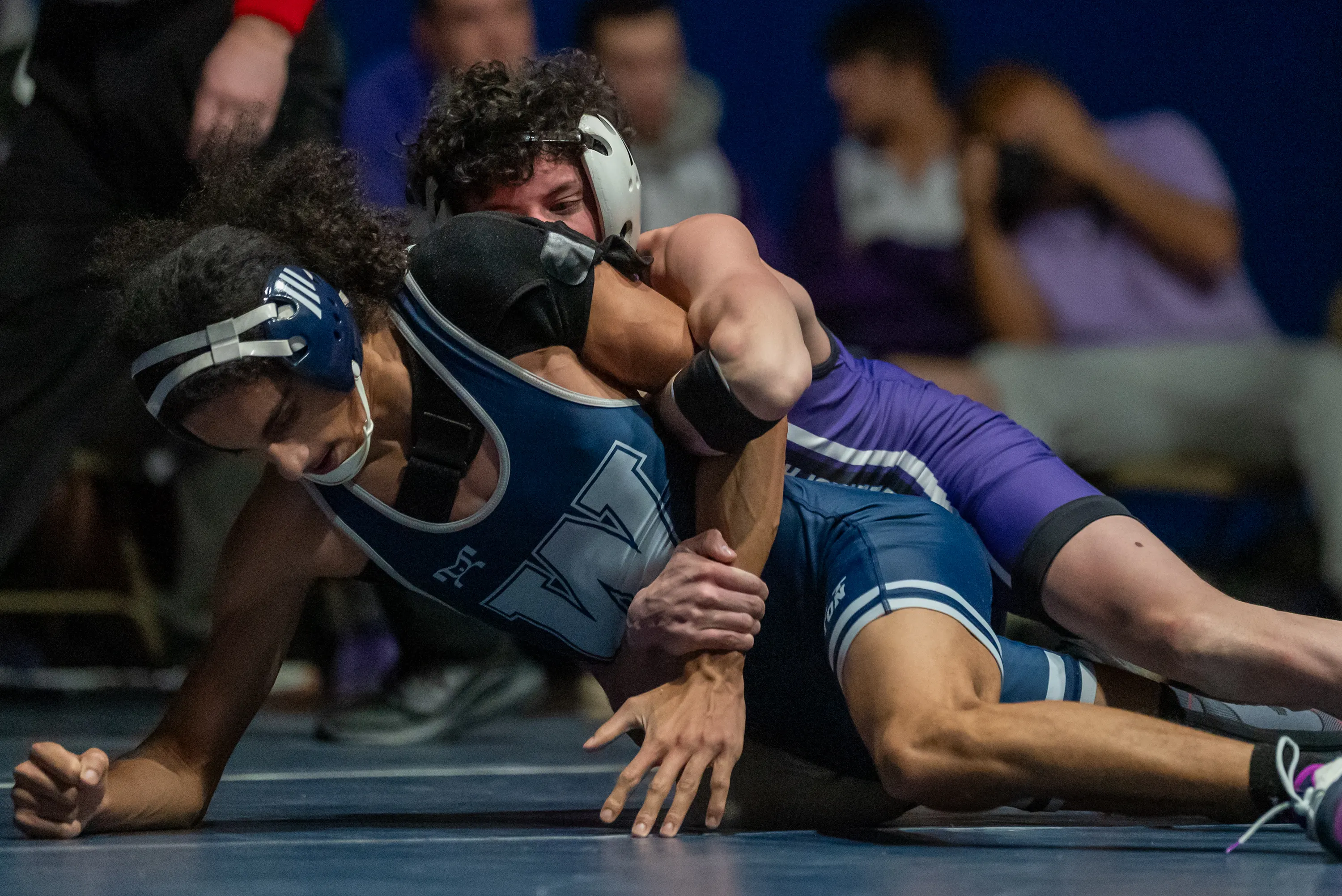 Wallenpaupack’s Ayden Blaut, top, wrestles West Scranton’s Anthony Olavarria during...