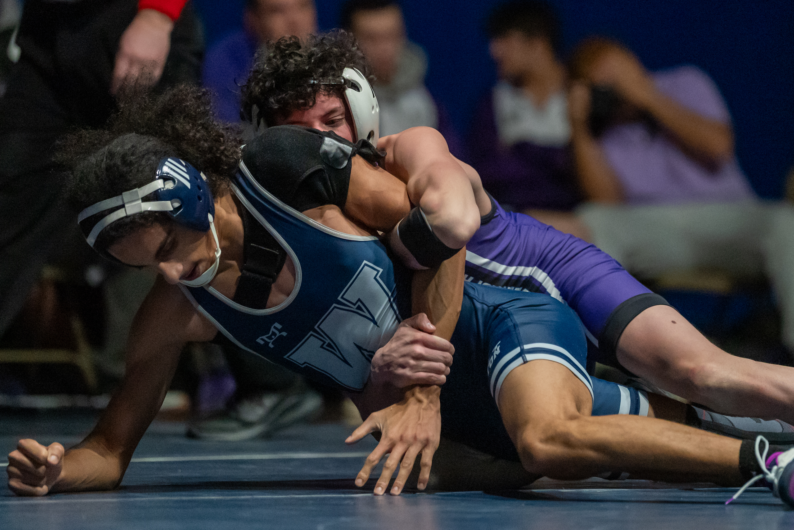 Wallenpaupack’s Ayden Blaut, top, wrestles West Scranton’s Anthony Olavarria during...