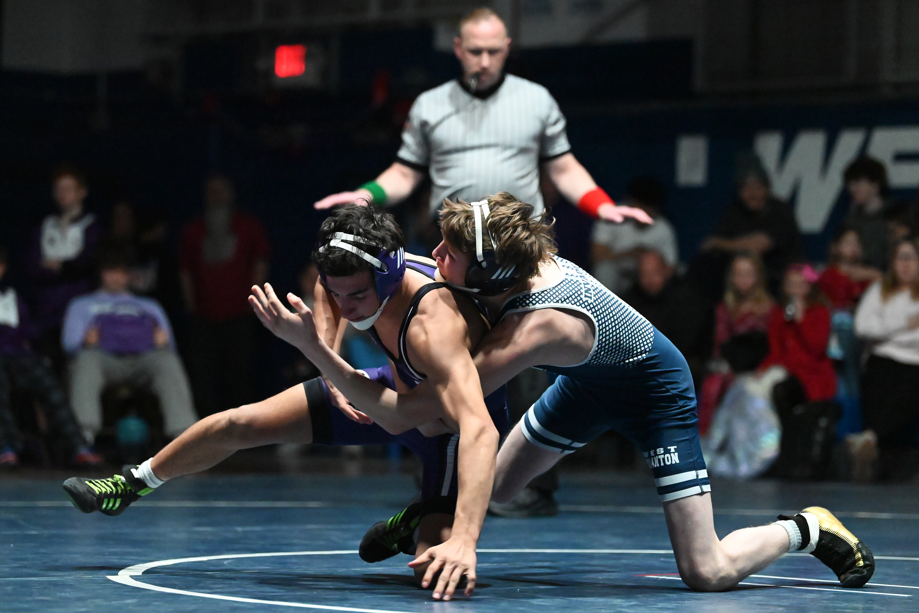 West Scranton’s Connor Lagier, right, competes against Wallenpaupack’s Giovanni Lomonaco...