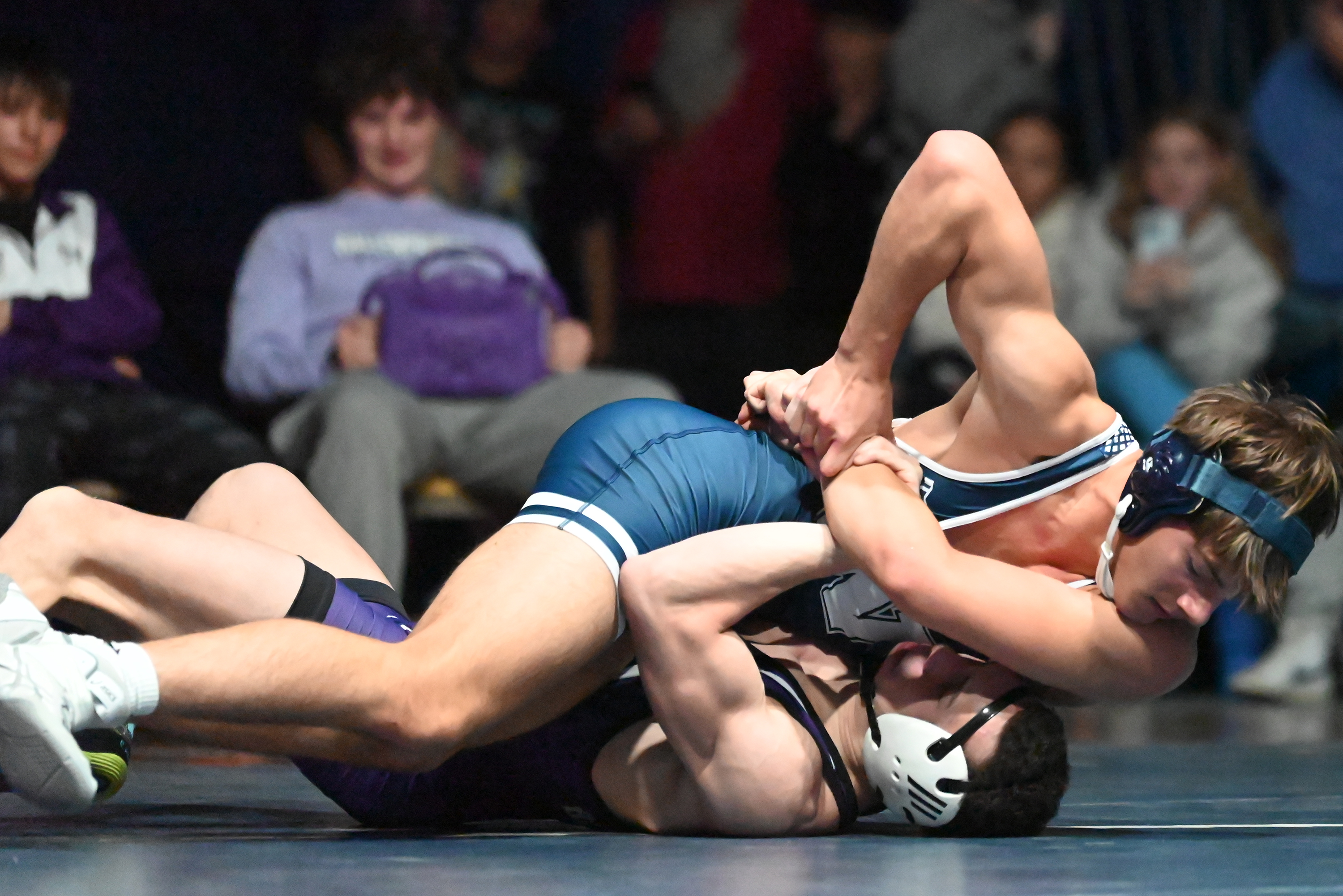 Wallenpaupack’s Tristan Braxton, bottom, wrestles West Scranton’s Evan Walsh during...