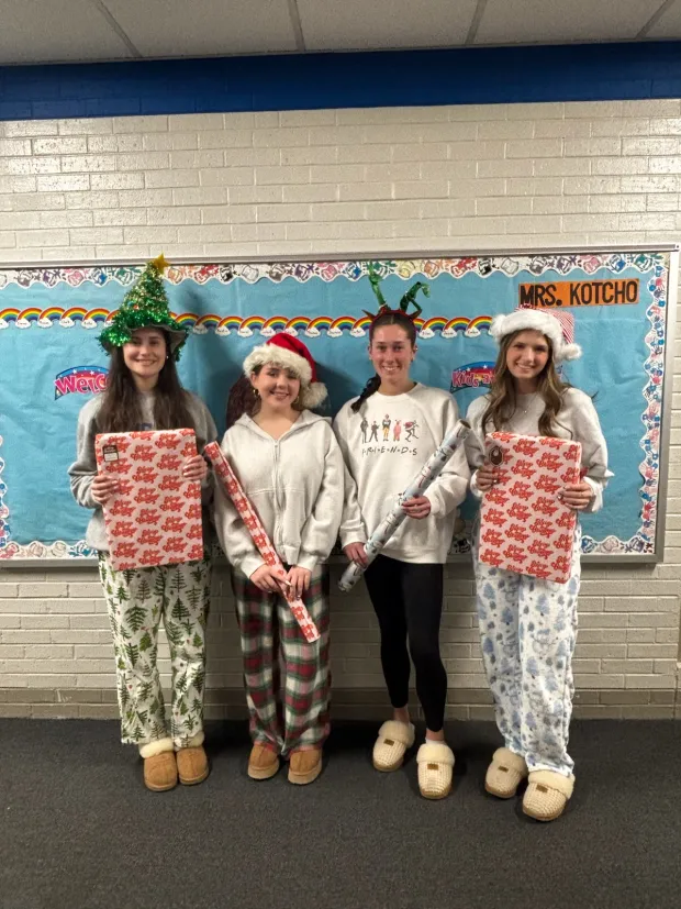 Some Valley View students who wrapped gifts Thursday came dressed for the occasion: Giada Costa, Molly Conway, Lily Smith and Maddy Dench. (Courtesy of Stephanie Decker)