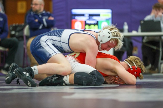 Abington Heights' Dakota Sandy, top, wrestles Blue Ridge's Aidan Tanzini during the Lackawanna League Championships on Saturday at Wallenpaupack. (JASON ARDAN / STAFF PHOTOGRAPHER)