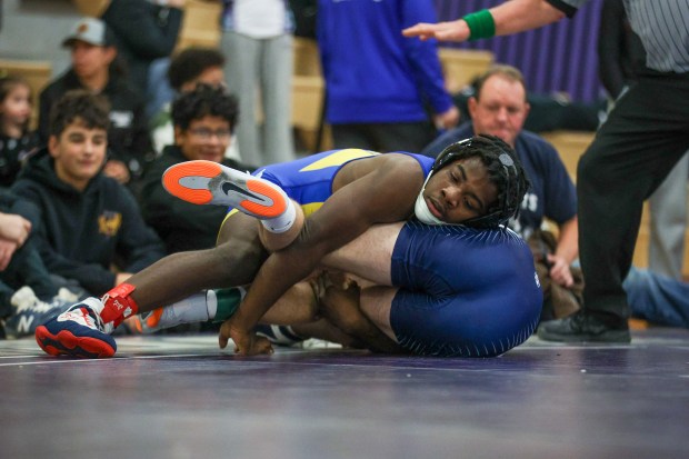 Valley View's Tywone Giles, top, wrestles Abington Heights' Chace Berry during the Lackawanna League Championships on Saturday at Wallenpaupack. (JASON ARDAN / STAFF PHOTOGRAPHER)