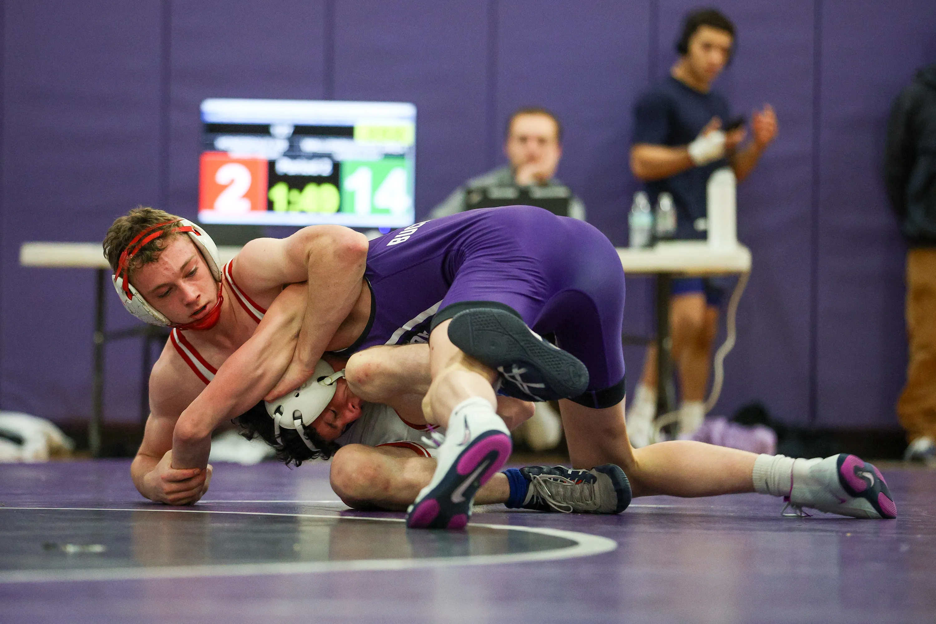 Honesdale’s Brody Walsh, left, and Wallenpaupack’s Ayden Blaut wrestle Saturday...