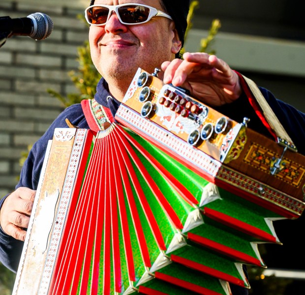 Fritz Scherz of Fritz's Polka Band plays festive music on the accordion Saturday, Dec. 20, 2025, during Christkindlmarkt in Bethlehem. The German-inspired holiday market features artisan vendors, festive treats, family activities. Sunday, Dec. 21, 2025, is the last day for sales. (April Gamiz/The Morning Call)