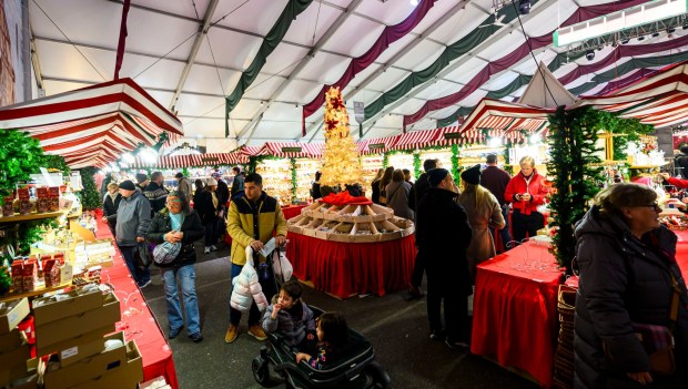 Käthe Wohlfahrt's glass ornaments seem to glow in the light Saturday, Dec. 20, 2025, during Christkindlmarkt in Bethlehem. The German-inspired holiday market, which closes Sunday, Dec. 21, 2025, features artisan vendors, festive treats and family activities. (April Gamiz/The Morning Call)