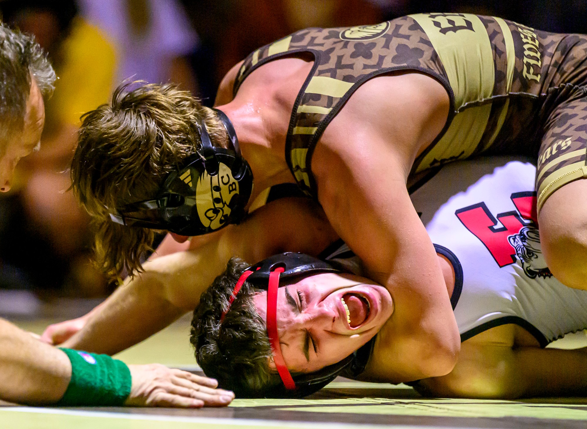 Bethlehem Catholic's Nico Emili wrestles Easton's Tanner Milburn in the 121-pound weight class Wednesday, Dec.17, 2025, in Bethlehem. (April Gamiz/The Morning Call)